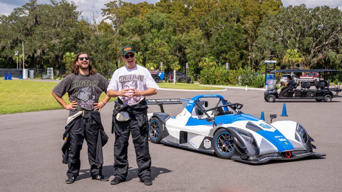 drivers in front of Radical race car