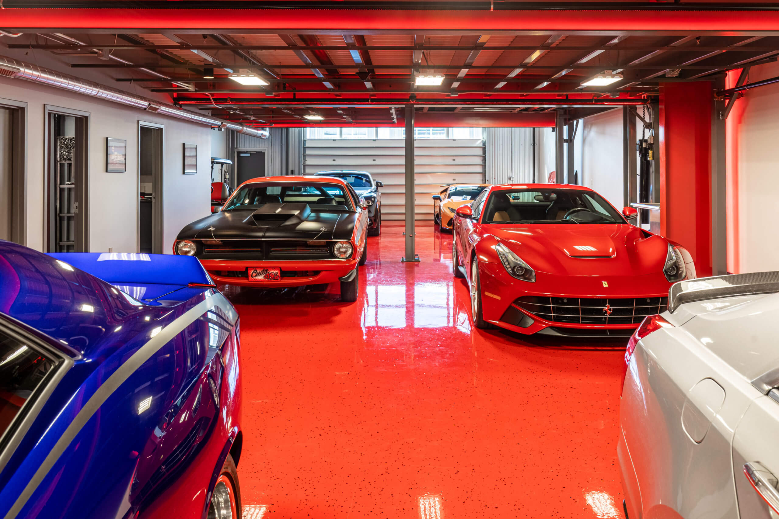 cars in red garage