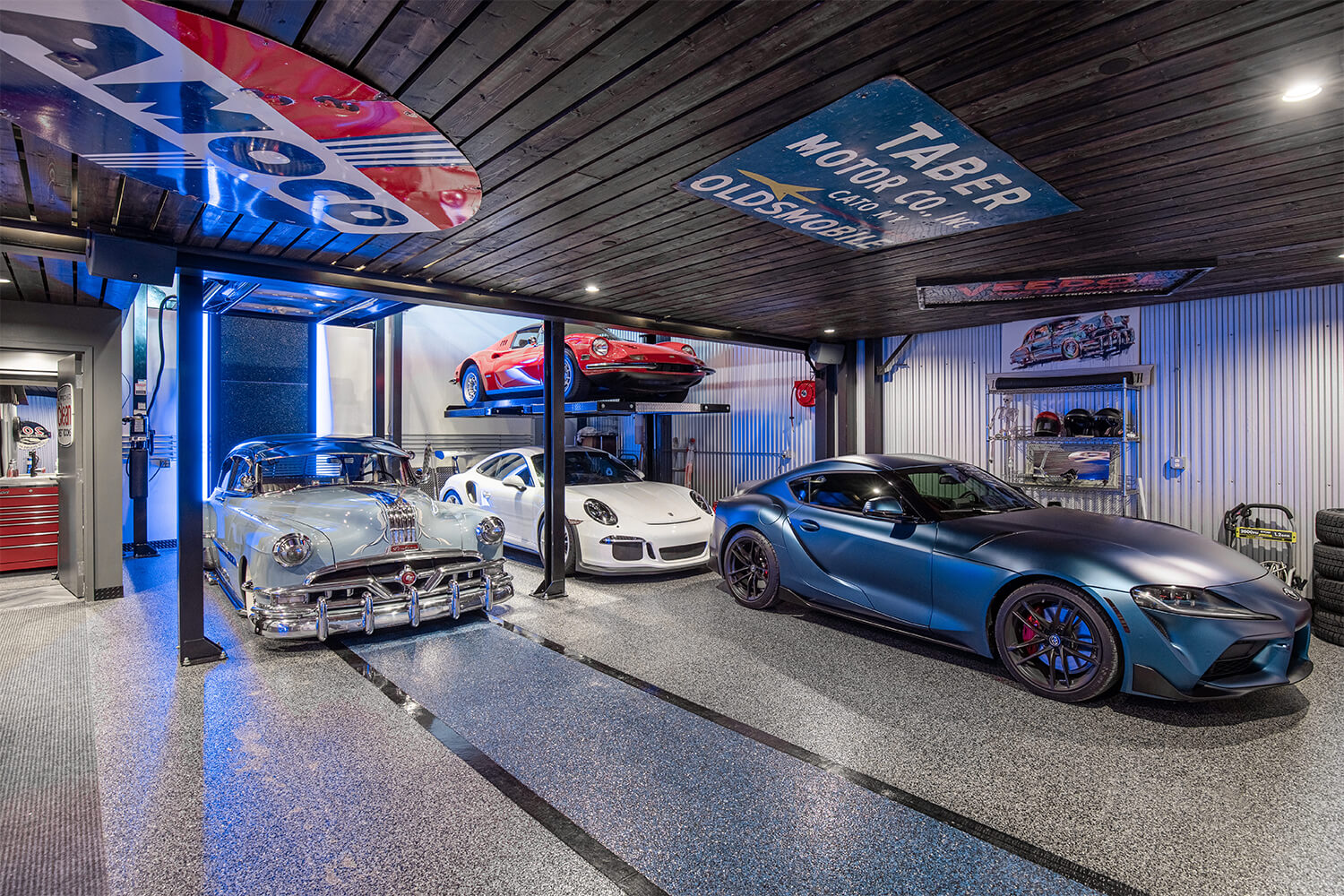 cars in gray and blue garage