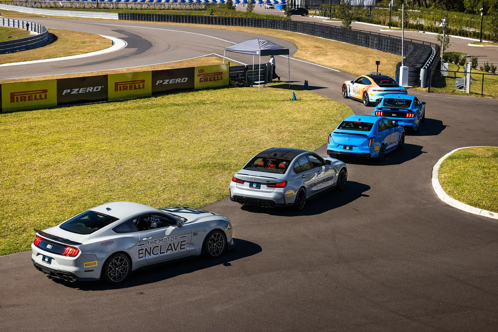 group of cars on track